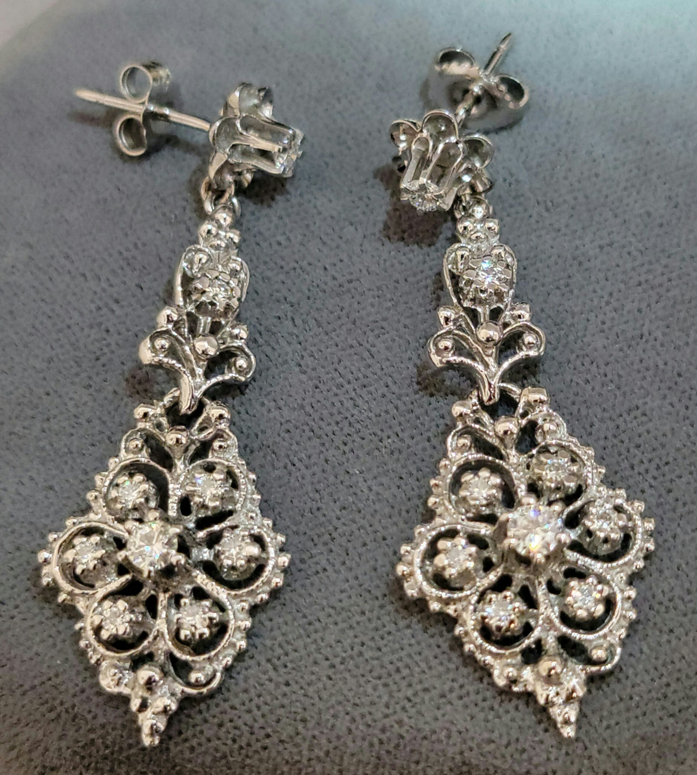 14K White Gold Pierced style Diamond Earrings in a Long Dangle style