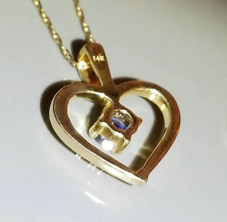 14K Yellow Gold Heart Shaped Pendant set with a Round Faceted Natural Sapphire - Image 2