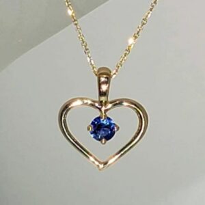 14K Yellow Gold Heart Shaped Pendant set with a Round Faceted Natural Sapphire