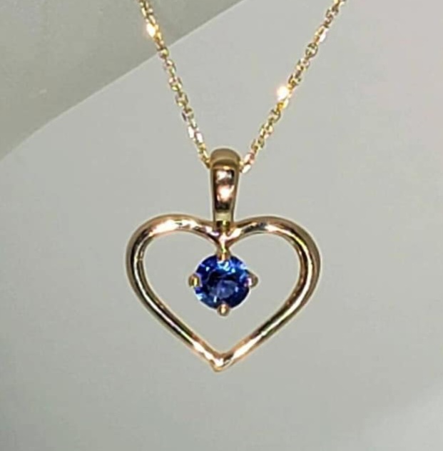 14K Yellow Gold Heart Shaped Pendant set with a Round Faceted Natural Sapphire