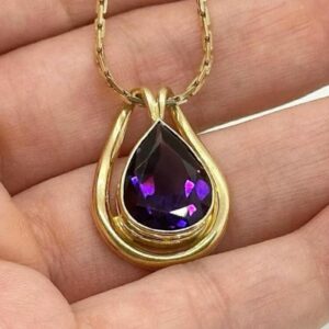 18K Marked 750, Yellow Gold Pear Shaped Amethyst Pendant. The Necklace Chain is Sold Separately
