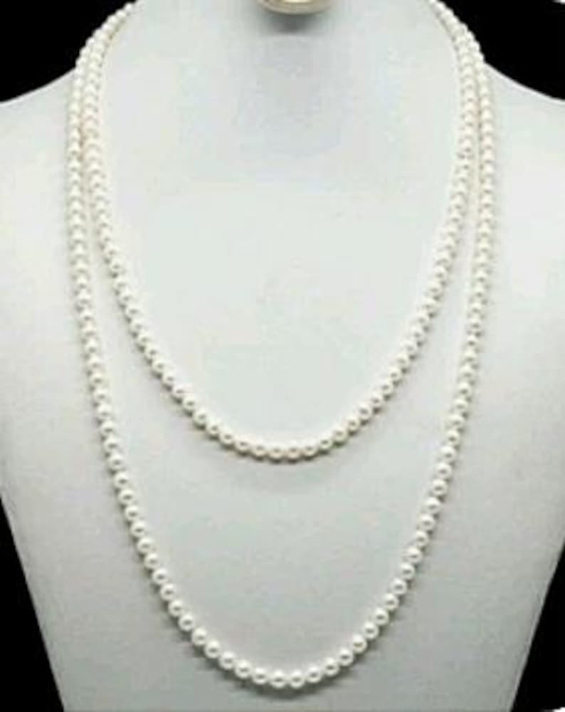 Saltwater Cultured Pearl Necklace Strand with a 14K Yellow Gold Clasp. The Necklace Strand is 18” Inches in Length
