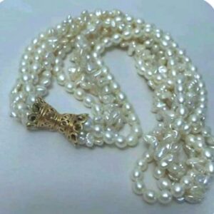 Multi Strand Freshwater Pearl Necklace with a 14K Yellow Gold Fancy Bow Shaped Clasp