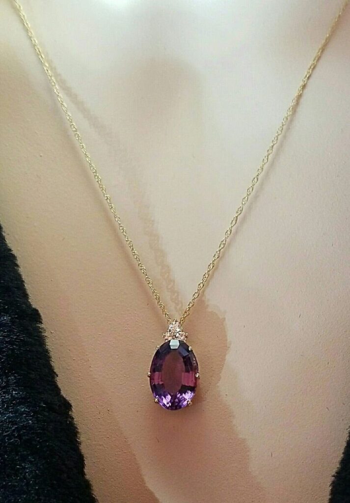 14K Yellow Gold Amethyst and Diamond Pendant with a 14K Yellow Gold Woven Rope style Chain